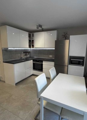 Charmante 2-Zimmer Wohnung mit Garten und Tiefgaragenstellplatz