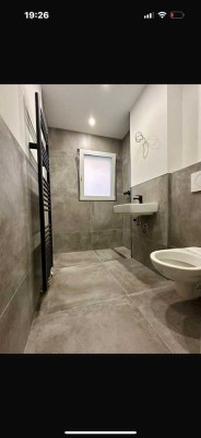 Top sanierte 3,5 Zimmer Wohnung mit Garten und Einbauküche