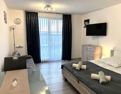 CHARMANTES APPARTEMENT mit unverbaubarem Bergpanorama und eigener Gartenterrasse