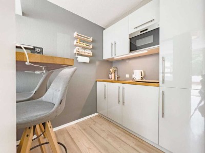 Stylisches Single-Appartement mit großer Terrasse & TG-Stellplatz!