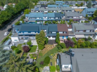 Wohnen in Bestlage! Gepflegtes Reihenmittelhaus mit Garten & Tiefgarage