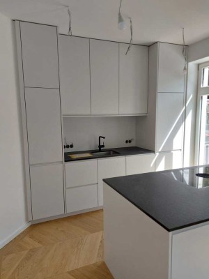 Kernsanieter Altbau mit moderner Raumaufteilung und hochwertigen Schreinereinbauten