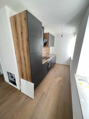 Zentrale 1-Zimmer-Wohnung nach Kernsanierung mit EBK am Bahnhof Großkarolinenfeld