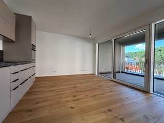 Attraktives Wohnen in beliebter Lage - 2-Zimmer-Erdgeschosswohnung mit Loggia und Garten.