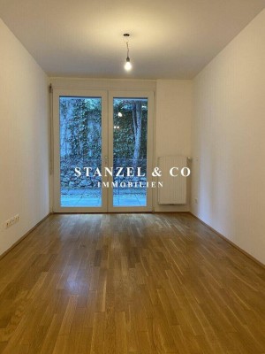 HELLES 2-ZIMMER-APARTMENT MIT GARTENTERRASSE ( BJ 2007 )