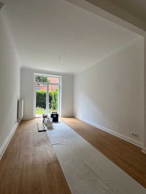 Erstbezug nach vollständiger Sanierung! 2-Zimmer-EG-Wohnung mit Wohnküche & kleinem Garten