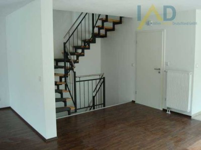 Charmantes Reiheneckhaus mit großzügiger Dachterrasse und idyllischem Garten in ruhiger Lage.