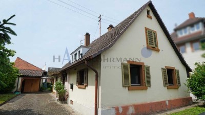Sanierungsbedürftiges Einfamilienhaus mit tollem Grundstück in KA-Daxlanden