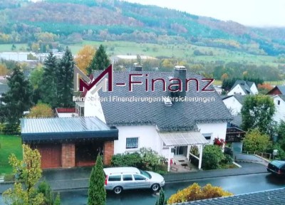 Traumhaftes Einfamilienhaus mit Einliegerwohnung*2 Garagen*Garten*ruhige Lage