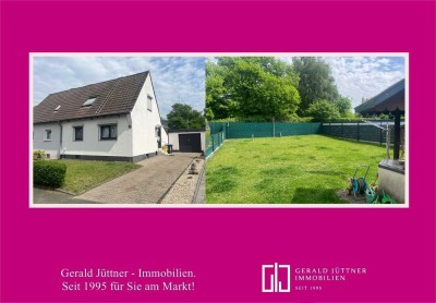 Bottrop-Batenbrock: Moderne Doppelhaushälfte mit Anbau, Doppelgarage und großem Grundstück