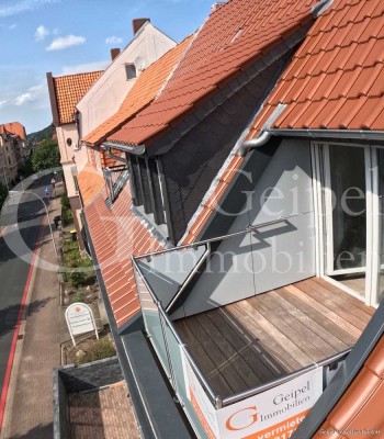 geipel.de - Traumhafte Dachgeschosswohnung mit Balkon in zentraler Lage von Alfeld (Leine)