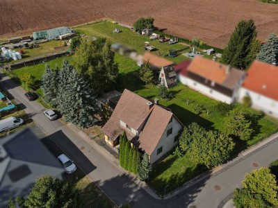 Freiraum und Weitblick in der Rhön genießen: Immobilie mit großem Grundstück in Feldrandlage