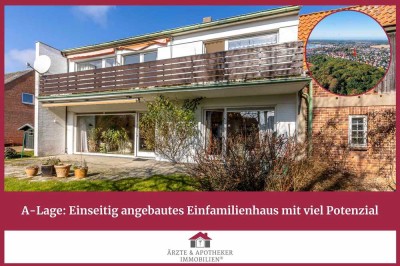 A-Lage: Einseitig angebautes 
Einfamilienhaus mit viel Potenzial