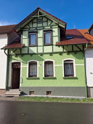 Hübsches kleines Einfamilienhaus mit Garten und Garage!