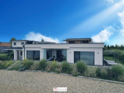 EXKLUSIVER BUNGALOW AM SEE - ERSTE REIHE MIT TRAUMHAFTEM AUSBLICK