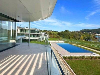 Architektenwohnung mit Infinity-Pool in direkter Seelage