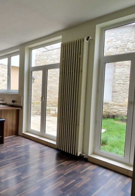 Lichtdurchflutete Wohnung mit privater Gartenoase