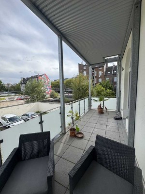 Modernisierte 2-Raum-Wohnung mit Balkon und Einbauküche in Düsseldorf