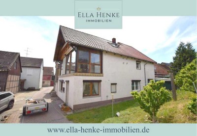 Idyllisch gelegenes Einfamilienhaus mit wunderschönem Garten + Garage.