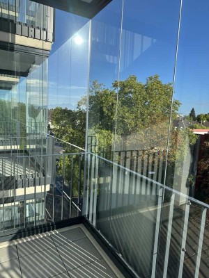 Neubau - charmante 2-Zimmer-Wohnung mit Wintergarten/Balkon