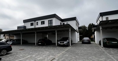 Neubau 3 Zimmer Erdgeschosswohnung mit Terrasse und Garten