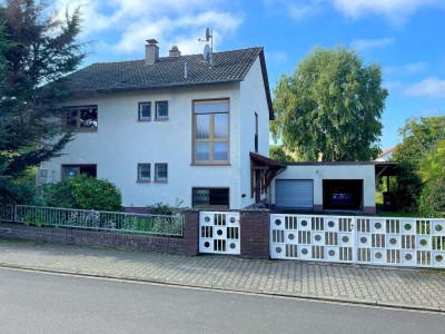 Bruchmühlbach-Miesau - Familienfreundliches Einfamilienhaus mit schönem Garten und Garagenkomfort