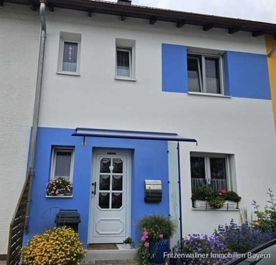 Modernes Reihenmittelhaus mit Kamin, Wintergarten und idyllischem Garten