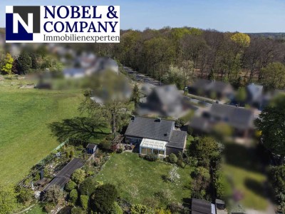 Ruhiges Wohnglück auf einer Ebene - Stilvoller Bungalow mit Gartenidylle