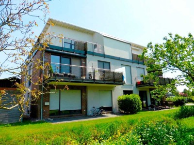 vermietete 3-Zimmer-Eigentumswohnung von 2013 mit Balkon & Carport