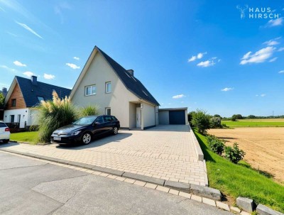 Exklusives Einfamilienhaus mit Pool und großem Garten am Feldrand