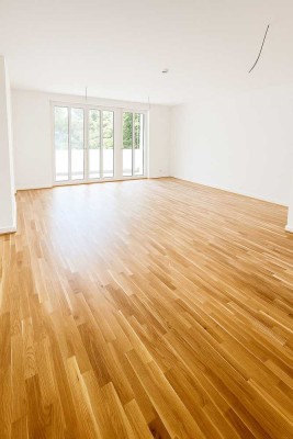 Exklusive Neubauwohnung im Townhouse-Stil mit höchstem Wohnkomfort und idyllischem Gartenanteil