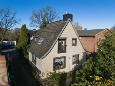 Zuhause mit Perspektive: Einfamilienhaus mit Anbau und flexibler Raumstruktur