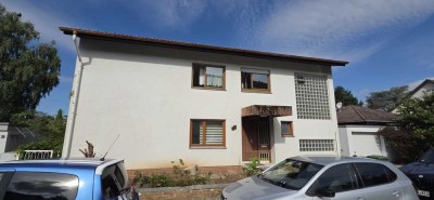 Grundstück mit kernsanierungsbedürftigem Haus und Baugenehmigung für Mehrfamilienhaus