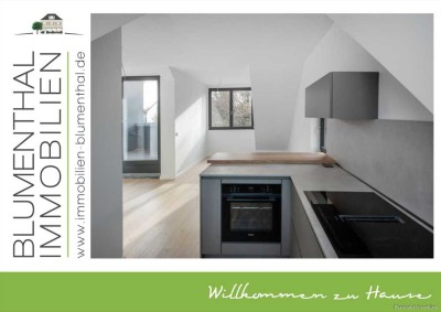 Erstbezug nach Sanierung: Außergewöhnliche loftähnliche Dachgeschosswohnung mit Dachterrasse