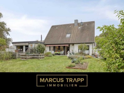 Clever investieren & selbst wohnen: Einfamilienhaus mit schöner Gartenwohnung in ruhiger Sackgasse
