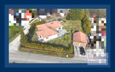 Bungalow mit großzügigem Garten, zwei Garagen und Platz für Wohnmobil – ideal für Familien