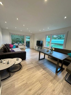 Wohnen mit Stil: Erdgeschosswohnung mit Terrasse & Garage!
