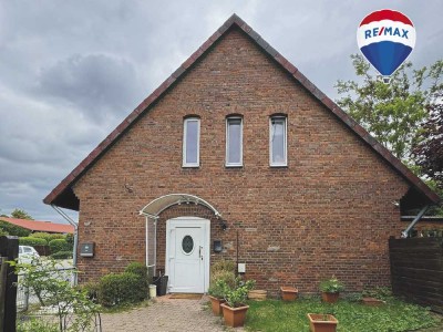 Vermietete Doppelhaushälfte mit Scheune