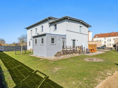 Charmantes Einfamilienhaus mit kleiner Gewerbeeinheit auf ca. 1.094 m² Eigengrundstück in  Jarmen