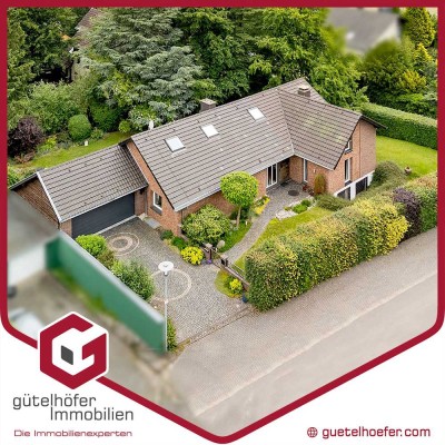 Stilsicher Wohnen! Großzügiges Einfamilienhaus mit Kaminzimmer und Doppelgarage auf 1.073m² Grund