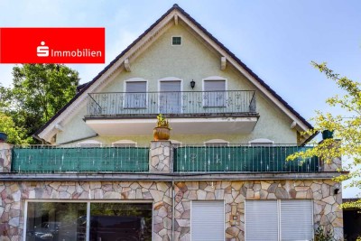 Zweifamilienhaus mit Gewerbeeinheit in Brechen