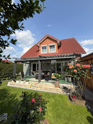 Charmantes Einfamilienhaus auf Einzelgrundstück mit Wintergarten