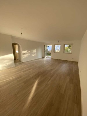 Helle Gartenwohnung mit Südterrasse, Einbauküche & TG-Stellplatz - Dreieich-Offenthal