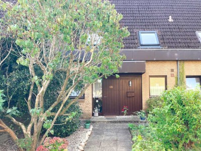 Großzügiges Reihenmittelhaus - aktuell vermietet - mit sonnigem Garten und Garage zu verkaufen.