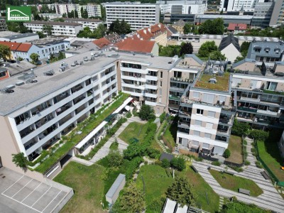Grünblick mitten in der Stadt: 2-Zimmer-Neubauwohnung in Hofruhelage