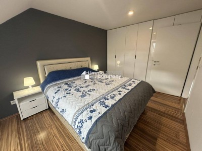 Dachgeschosswohnung in 1040 Wien – modern, geräumig, mit Balkon!