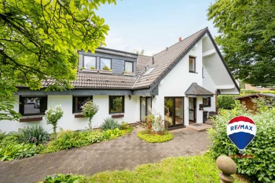 Repräsentatives Einfamilienhaus mit  Einliegerwohnungen und Traumgarten