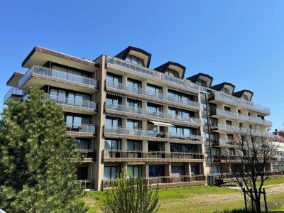 Sonnige Ferienwohnung mit Fahrstuhl und Balkon in begehrter Strandlage