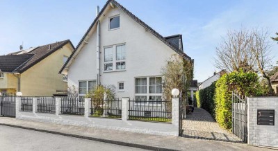 Weiße Stadtvilla für Eigennutzer mit Mieteinnahmen