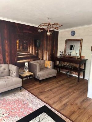 Stilvoll modernisierte 3-Zimmer-Wohnung mit Garten , Terrasse und zwei Stellplätzen